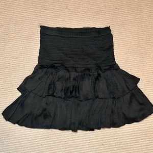 Black ruffled mini skirt